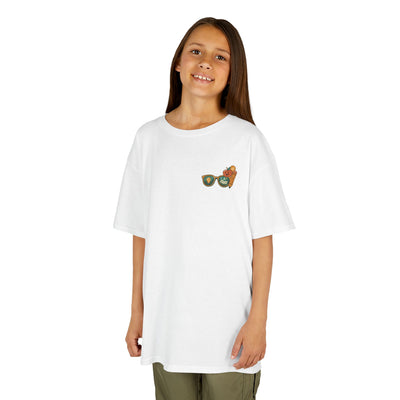 Smiling child wearing a white t-shirt with colorful graphic, perfect for back-to-school and motivational vibes.