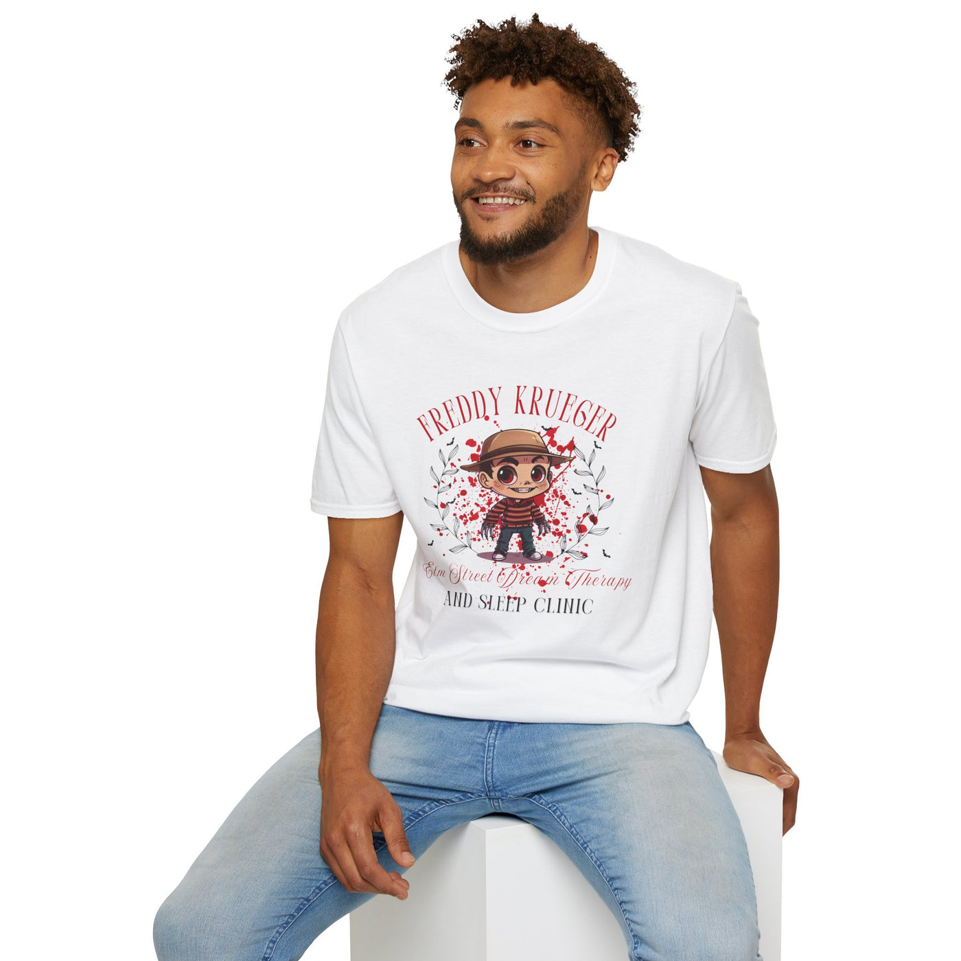 Man wearing Freddy Krueger Halloween tee with chibi design, featuring Elm Street Dream Therapy and Sleep Clinic.