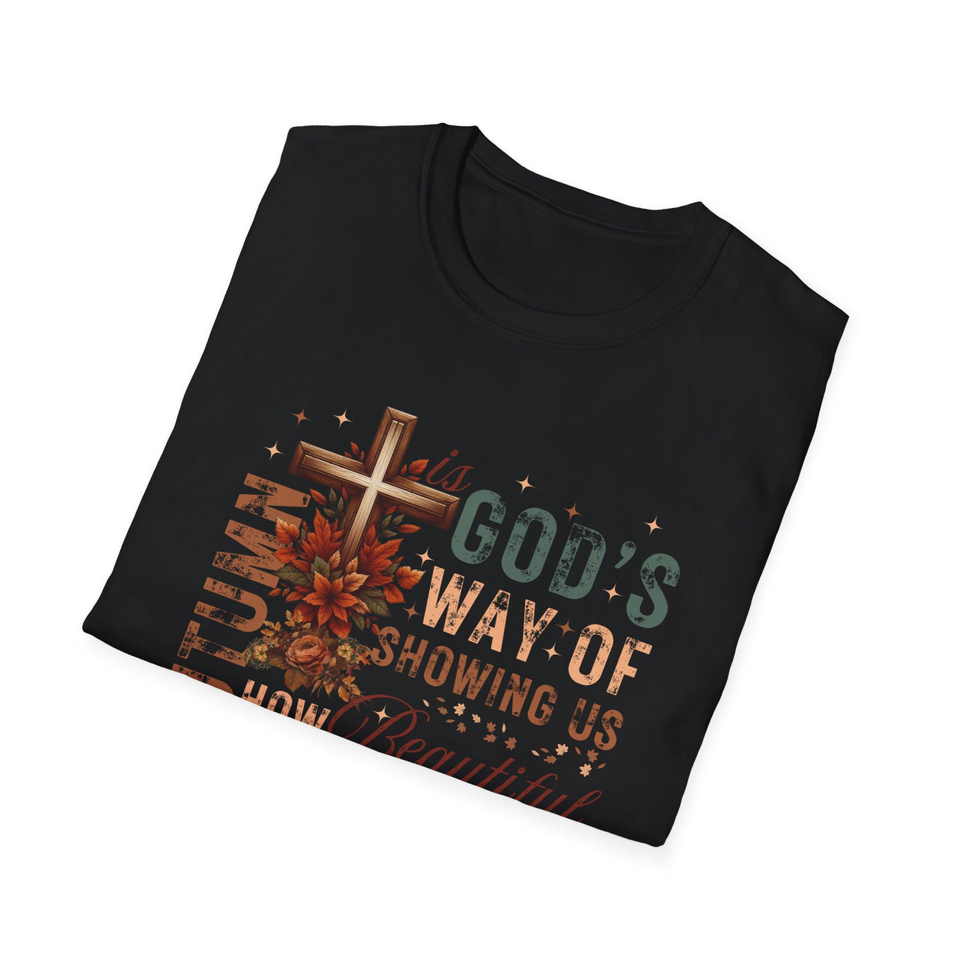 Black tee featuring the phrase 'Autumn Is God's Way of Showing Us How Beautiful' with autumn-themed graphics.
