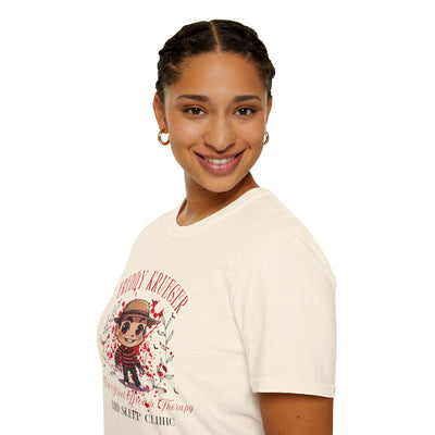 Model wearing Freddy Krueger Halloween tee featuring chibi design and Elm Street Dream Clinic logo.