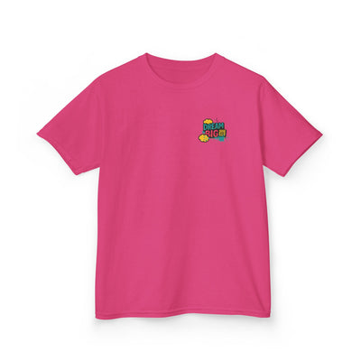 Pink kids tee with 'Dream Big. Show Up. Repeat.' motivational design, perfect for back-to-school confidence.