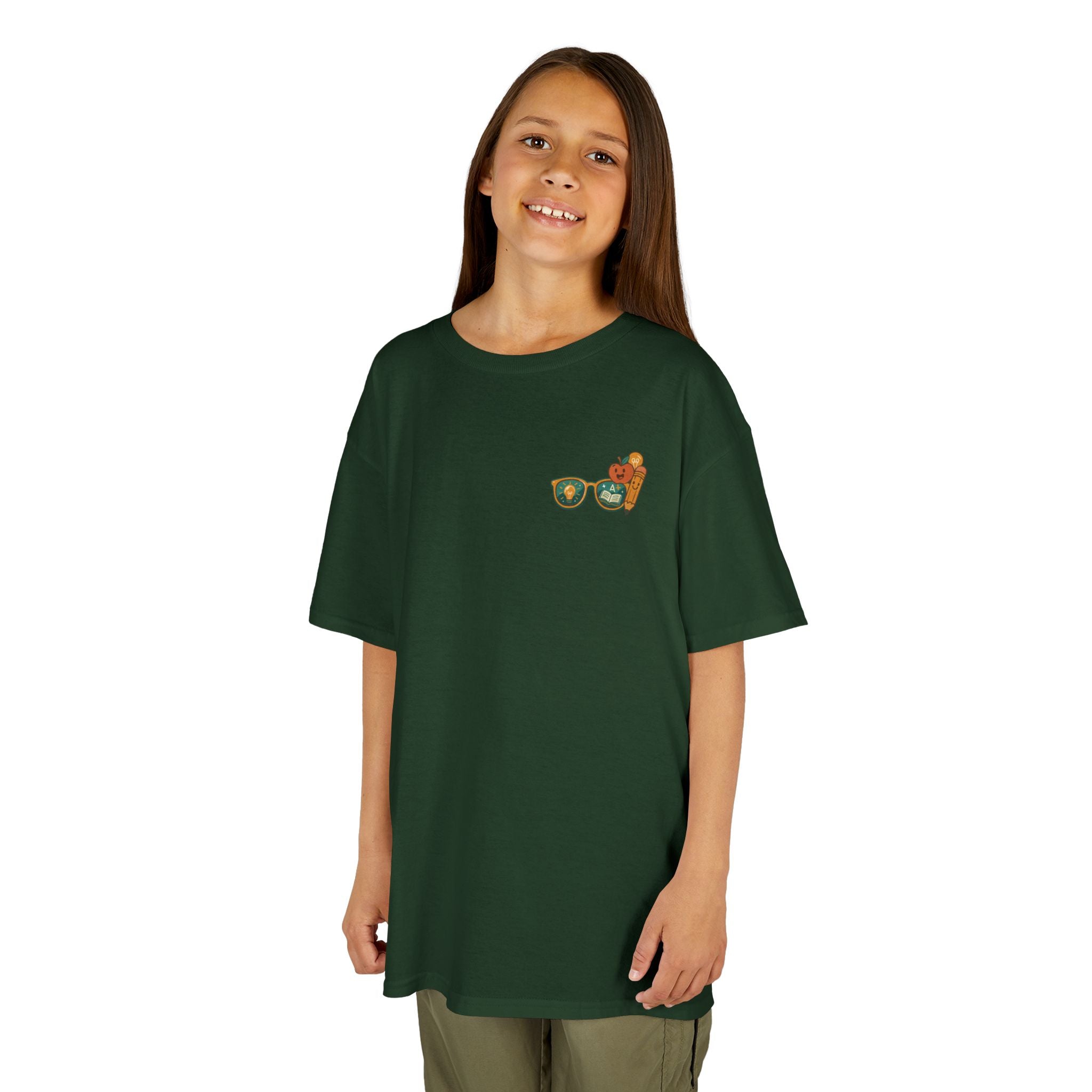 Smiling child wearing a green Smart Looks Good On Me t-shirt with graphic glasses, perfect for back-to-school style.