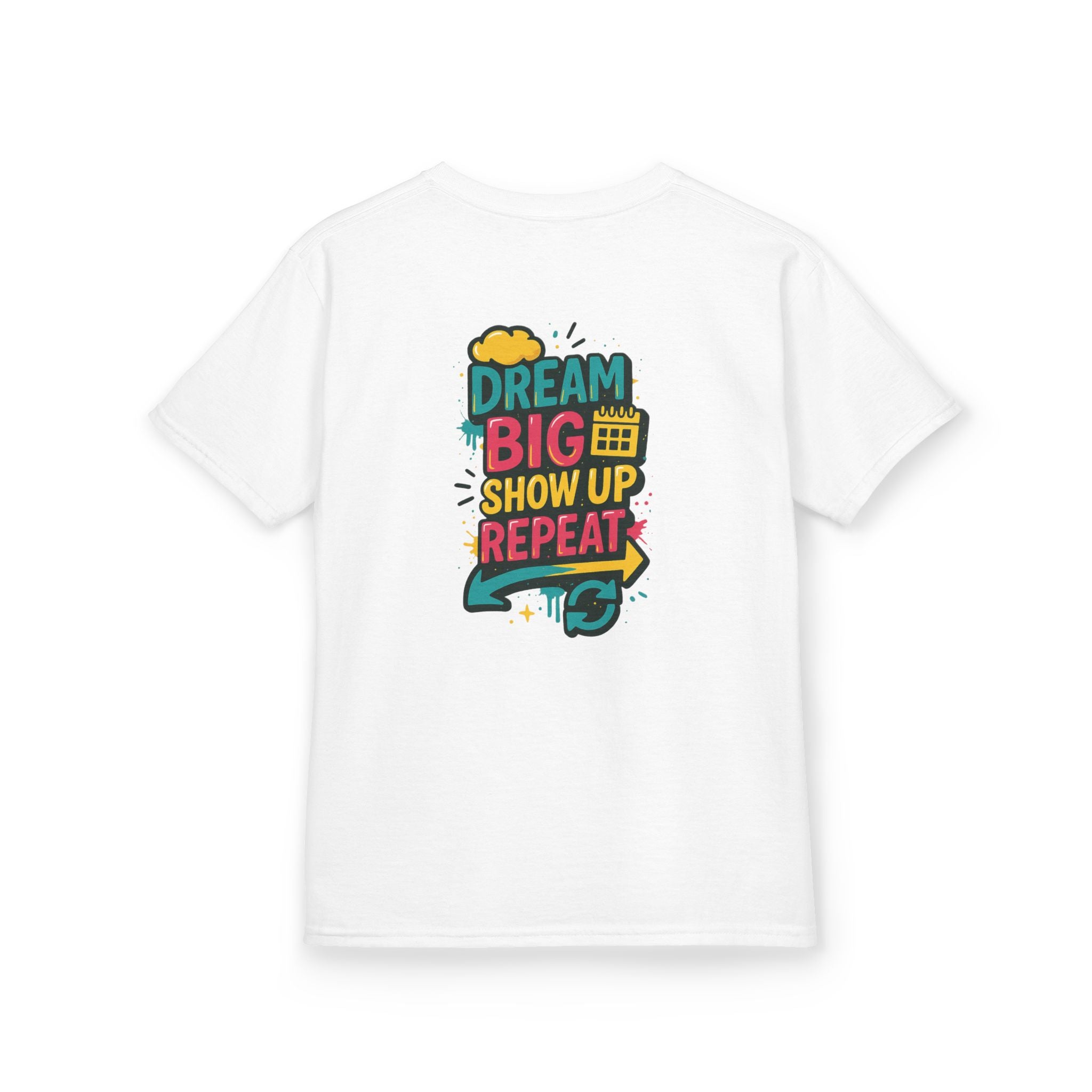 White kids tee featuring 'Dream Big. Show Up. Repeat.' motivational design in vibrant colors.