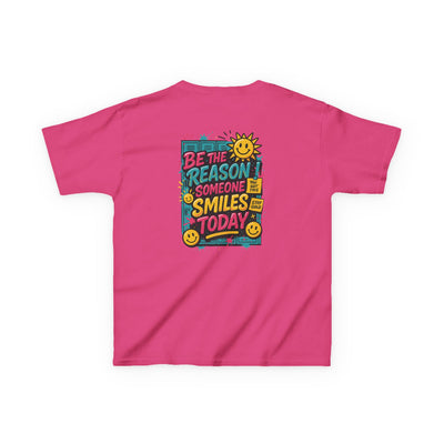 Back view of a pink kids tee featuring the quote 'Be The Reason Someone Smiles Today' with a cheerful sun graphic.