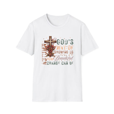White t-shirt featuring autumn-themed design with text 'Autumn Is God's Way of Showing Us How Beautiful Change Can Be'.