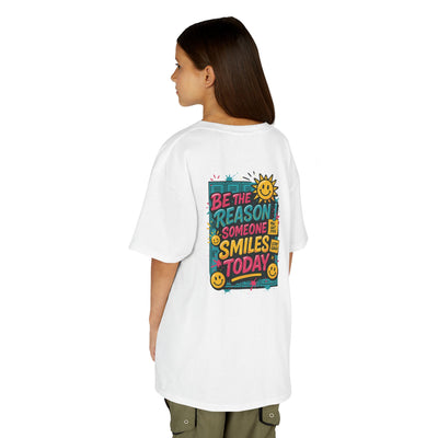 Kids motivational back-to-school tee with cheerful sun graphic and "Be The Reason Someone Smiles Today" text on back.