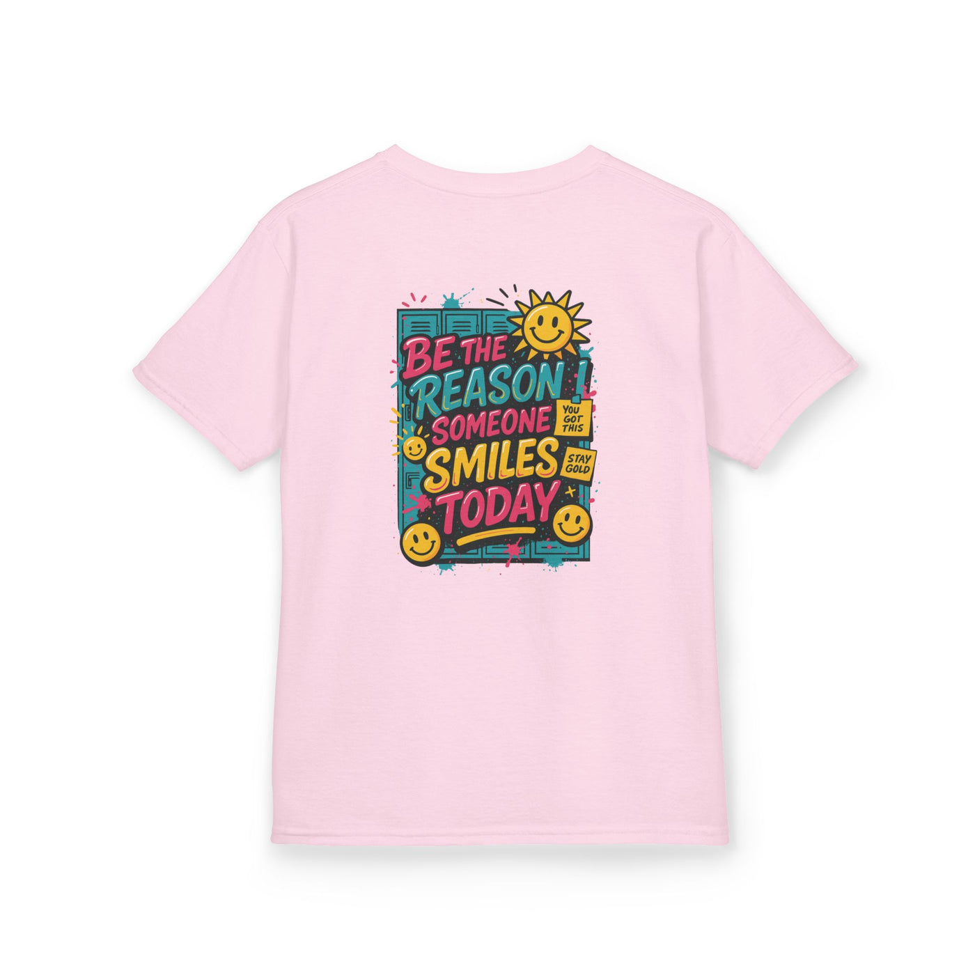 Kids motivational back-to-school tee in pink with colorful 'Be The Reason Someone Smiles Today' graphic.