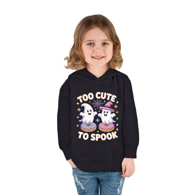 Child wearing a black hoodie with Halloween-themed design on a white background