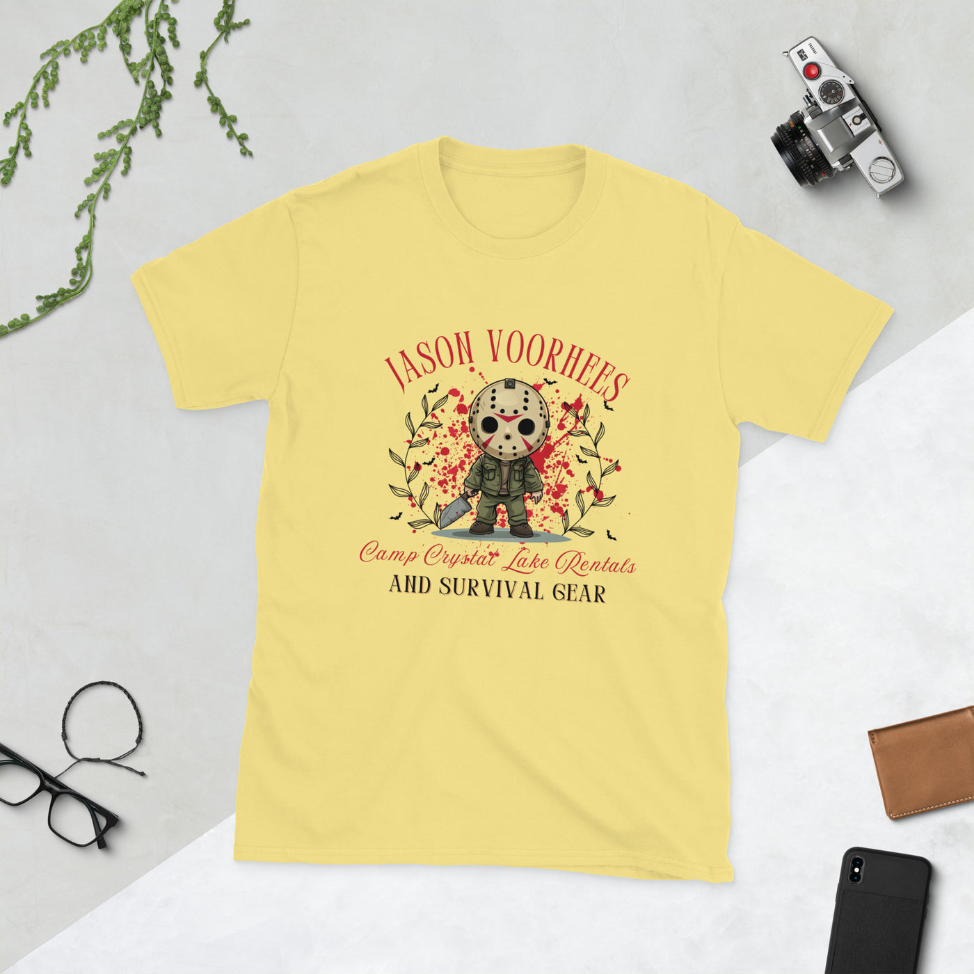 Yellow Halloween tee featuring Jason Voorhees with Camp Crystal Lake Rentals design for spooky fall vibes.