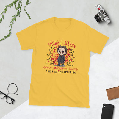 Michael Myers Halloween tee featuring cartoon graphic, fall leaves, perfect for horror fans and festive fun.