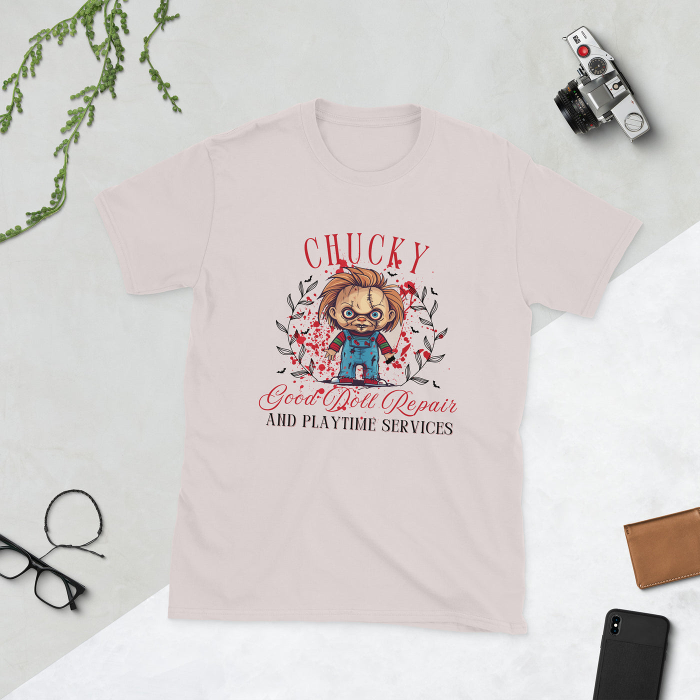 Chucky-themed Halloween t-shirt with 'Good Doll Repair' design, perfect for spooky season and Halloween parties.