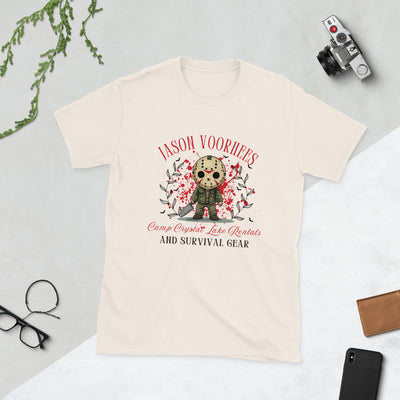 Cream t-shirt featuring Jason Voorhees design with "Camp Crystal Lake Rentals" and spooky graphics.