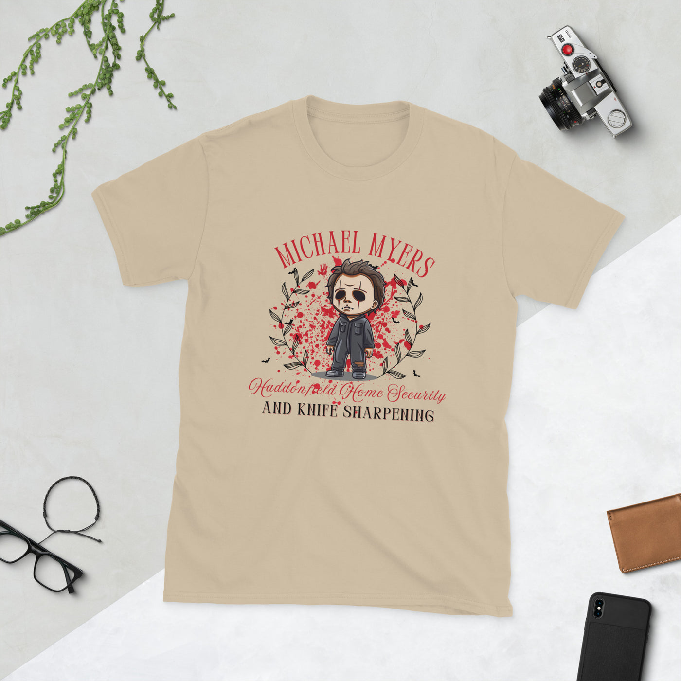 Michael Myers Halloween t-shirt with cartoon graphic, humor, home security, and knife sharpening theme.