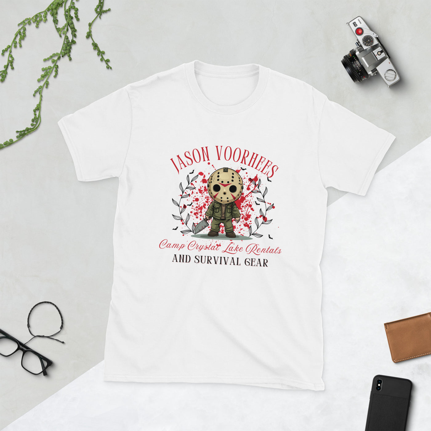 Jason Voorhees Halloween tee featuring Camp Crystal Lake Rentals and Survival Gear design in a spooky-cute style.